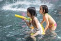 Asian Little Chinese Sisters playing at water park Royalty Free Stock Photo