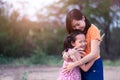 Asian little daughter hugging her mother  with love Royalty Free Stock Photo
