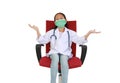 Asian little girl child in white doctor gown and protective mask with open arms wide sitting on red chair  on white studio Royalty Free Stock Photo