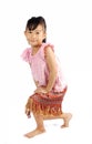 Asian little girl doing a curtsy in thai style