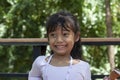 Asian little girl eating ice cream with deliciousness on summer.