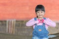 Asian Little Girl hand making heart shape Royalty Free Stock Photo