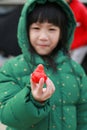 Asian little girl happy with strawberry tasting fresh in strawberry farm,Travel to Korea Royalty Free Stock Photo