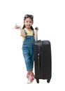 Asian little girl hold a plane in her hand and standing with lug