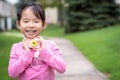 Asian little girl holding a plastic camera toy Royalty Free Stock Photo