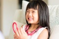 An asian little girl look comfortable when doctor examining by u