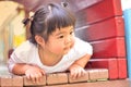 Asian little girl playing on playground thailand