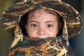 Asian little girl portrait with camo hat Royalty Free Stock Photo