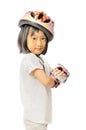 asian little girl in protective roller gear