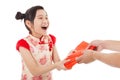 Asian little girl received red envelope Royalty Free Stock Photo