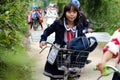 Asian little girl ride cycle from school