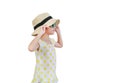 Asian little girl wearing sunglasses and straw hat isolated on white background with looking beside. Summer and fashion concept Royalty Free Stock Photo