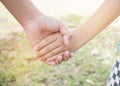 Asian little girls holding hands couple together show Relationship between sister and familay at outdoor, Love parents friendship