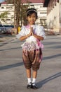 Asian little girls wearing traditional costume thai style to paying respect with a smile, activity at school. Royalty Free Stock Photo