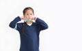 Asian little kid girl wearing medical face mask slung on her chin isolated on white background. Amid covid-19 pandemic concept