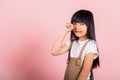 Asian little kid 10 years old bad mood her cry wipe tears with fingers Royalty Free Stock Photo