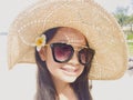 Asian long black hair girl is wearing black sunglasses, straw ha Royalty Free Stock Photo