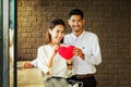 Asian Lover man and woman enjoy with cup of coffee in coffee s