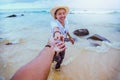 Asian lovers happy travel nature on the beach. Couple running on a sandy beach.Travel relax in summer Royalty Free Stock Photo