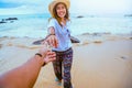 Asian lovers happy travel nature on the beach. Couple running on a sandy beach.Travel relax in summer Royalty Free Stock Photo