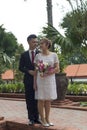 Asian loving couple pre-wedding outdoor photo shoot. Casual natural real people portraits. Loving romantic newly wed couple. Royalty Free Stock Photo