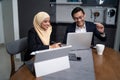 Asian malay couple working together at home Royalty Free Stock Photo