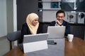 Asian malay couple working together at home Royalty Free Stock Photo