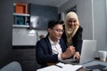 Asian malay couple working together at home Royalty Free Stock Photo