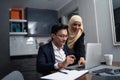 Asian malay couple working together at home Royalty Free Stock Photo