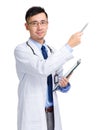 Asian male doctor with clipboard and pen indicate something Royalty Free Stock Photo