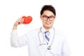 Asian male doctor show red heart Royalty Free Stock Photo