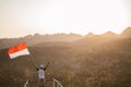 Asian male with indonesian flag celebrating independence day Royalty Free Stock Photo