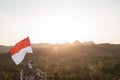 Asian male with indonesian flag celebrating independence day Royalty Free Stock Photo