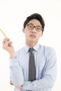 Asian male teacher with a pencil Royalty Free Stock Photo