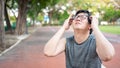 Asian man athlete feeling dizzy while doing exercise