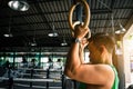 Asian man athlete gymnast rings exercise in gymnastics exercise