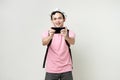 man backpacker take photo with mobile phone. digital nomad and travelling concept. on isolated background Royalty Free Stock Photo