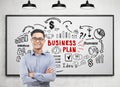 Asian man, business plan, whiteboard Royalty Free Stock Photo