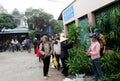 Asian man buying flowers in the market Royalty Free Stock Photo