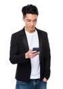 Asian man check the email on cellphone Royalty Free Stock Photo