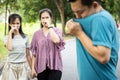 Asian man check his own smell,sniffing his wet armpit or sweating a lot because of hot weather or after exercise,husband bad smell Royalty Free Stock Photo