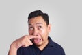 Asian Man Close His Nose Sick of Bad Smell Royalty Free Stock Photo