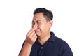 Asian Man Close His Nose Sick of Bad Smell Royalty Free Stock Photo