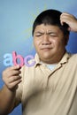 Asian man confused with abc