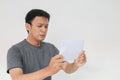 Asian man is cry and sad the white mail message or the bill