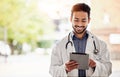 Asian man, doctor and tablet with smile in hospital for planning, research and consulting on blurred background. Clinic