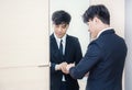Asian man dressing up for work Royalty Free Stock Photo