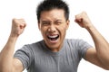 Asian man expressing his excitement Royalty Free Stock Photo