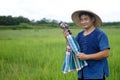 Asian man farmer is at paddy field