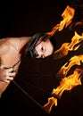 Asian man with fire show Royalty Free Stock Photo